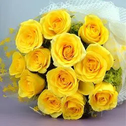 Bright Bouquet of Yellow Roses with Green Leaves