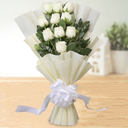 Elegant Bouquet of White Roses in White Tissue Wrap