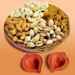 Splendid Gift of Assorted Dry Fruits with Pair of Diya